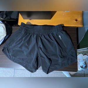 Lululemon black running shorts.